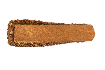 Smear of bright brown shimmery eyeshadow on an empty background. Beauty product, cosmetic application.
