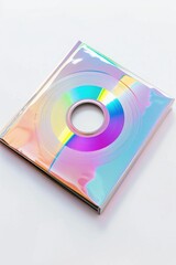 Fototapeta premium CD case with a rainbow design on it. The case is silver and has a hole in the middle