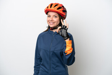 Young cyclist Lithuanian woman isolated on white background showing ok sign with fingers