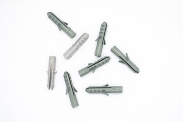 Plastic pegs isolated on white background