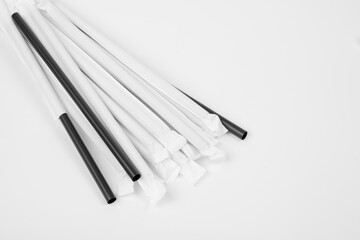 Black coffee straws. Plastic straws for drinks. Cocktail straws.
