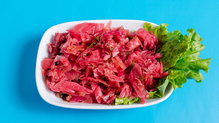 Pickled red cabbage plate isolated