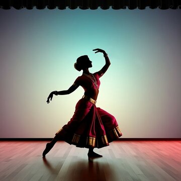 silhouette of a female dancer performing a classical dance pose