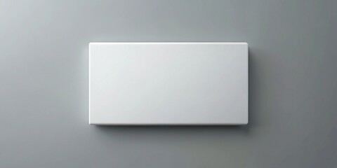 Fototapeta premium Rectangular white object on gray surface