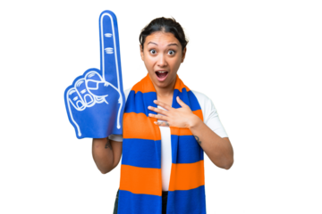 sports fan woman over isolated chroma key background surprised and shocked while looking right