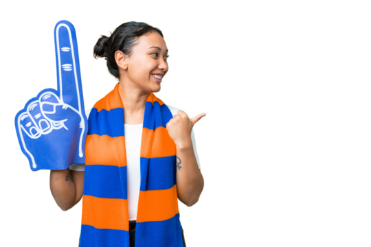 sports fan woman over isolated chroma key background pointing to the side to present a product