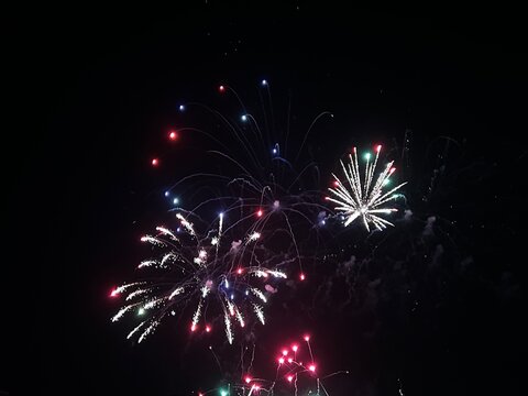 Fireworks display of lights in the sky with copy space 
