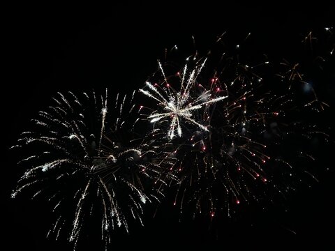 Fireworks display of lights in the sky with copy space 