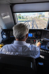 a train driver driving a regional train