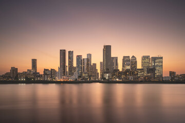 Fototapeta premium Canary Wharf at sunset, shot from the Greenwich peninsula .