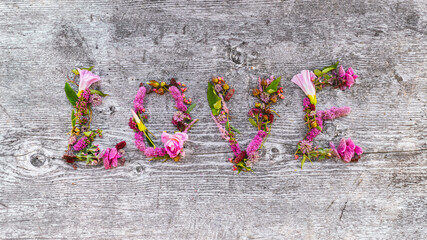 flowers on the ground "LOVE"