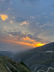 Naklejka premium sunset in the mountains