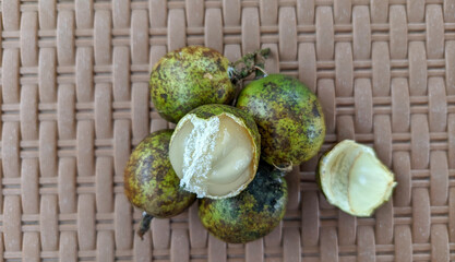 Selective focus on matoa fruit or Pometia pinnata. Matoa fruit is often found in Southeast Asia.