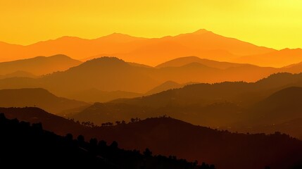 Obraz premium Vibrant Sunset Over Mountain Peaks