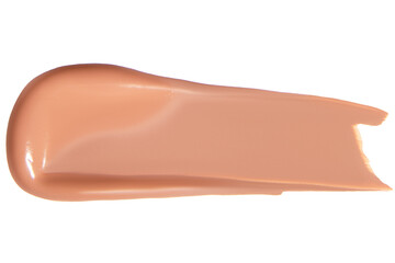 Smear of foundation cream on an empty background. Makeup product, beauty application.