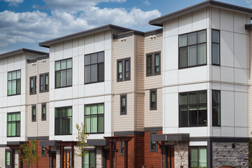 New Modern Apartment Buildings in Vancouver BC. Canadian modern residential architecture with walkway.