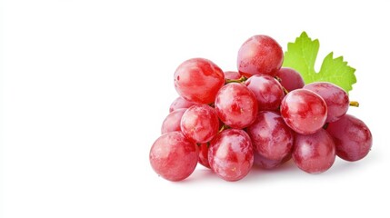 Fototapeta premium A large bunch of fresh ripe red grapes in pink with green leaves on a white background. 