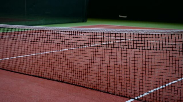Net on a tennis court.
Markings on a tennis court.
Tennis competitions.
Tennis game.
Tennis, game, tournament, play, racket, ball