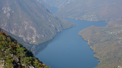 Scenic view of the Drina River winding through lush, forested mountains in Serbia, symbolizing peace and natural beauty