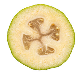 A green fruit with a white center