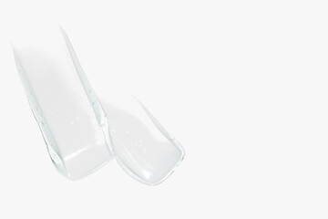 Composition of transparent gel smears on a light background. Skincare product, hydrating formula.