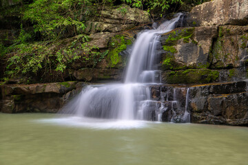 Fototapeta premium Tab tewa waterfall at dong phayayen-khao yai forest complex in pangsida national park. sakaeo province thailand.