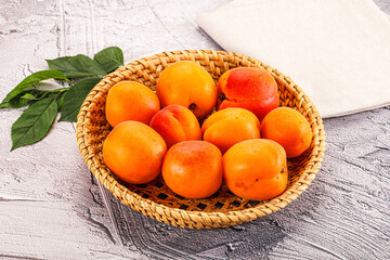 Raw ripe sweet apricots heap
