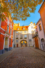 Obraz premium Old street in old Riga. The city is capital of Latvia that is well known to be a very popular tourism destination in the Baltic region