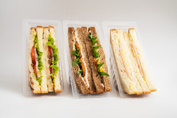 Assorted Packaged Sandwiches with Various Fillings