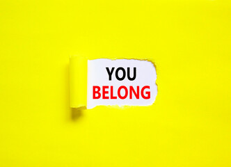 Belonging and you belong symbol. Concept words You belong on beautiful white paper. Beautiful yellow paper background. Business belonging and you belong concept. Copy space.