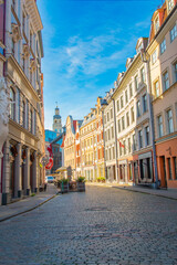 Obraz premium Old street in old Riga. The city is capital of Latvia that is well known to be a very popular tourism destination in the Baltic region