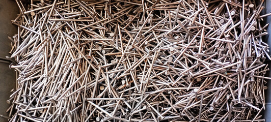 Close-up of a piles of nails spike isolated 