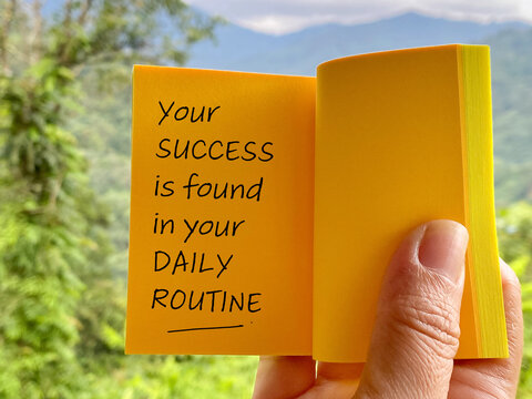 Your success is found in your daily routine. Note with nature background. Inspirational motivational quote. Stock photo.