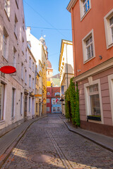 Old street in old Riga. The city is capital of Latvia that is well known to be a very popular tourism destination in the Baltic region