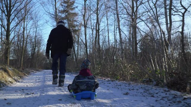 Kids bobsledding