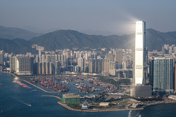 International Commerce Centre in West Kowloon Hong Kong reflecting sunlight