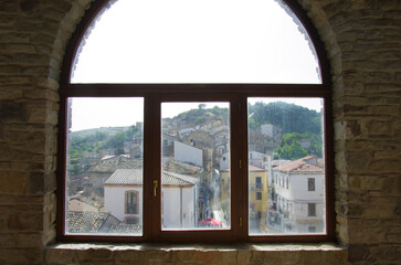 Fototapeta premium Civitacampomarano - Molise - Partial view of the small village seen from a window of the Angioino Castle.