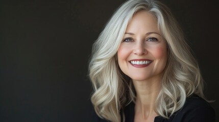 Confident blonde woman smiling, isolated in a portrait shot