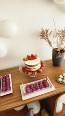 decorated birthday party with strawberry cake