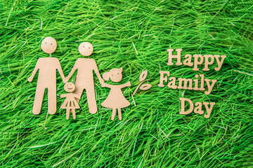 Text Happy Family Day with family holding hands