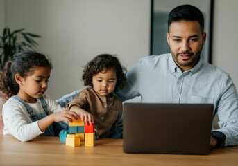 Father using laptop and working remotely while daughters playing with colorful building blocks at home