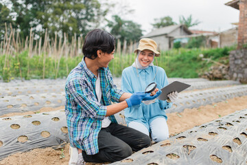 Farmers engage in agricultural research to improve crop yield and sustainability.