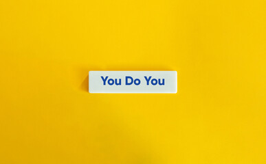 You Do You Slang Phrase. Blue Text on Letter Tiles on Yellow Background. Minimal Aesthetics.