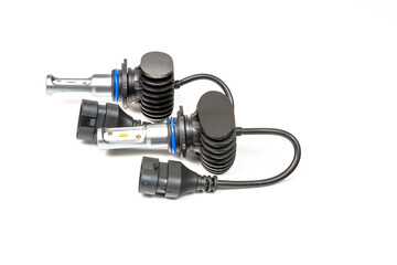 Light bulbs for car lamps. Automotive part in Silvery metallic and black color with wires and connecting elements