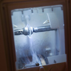 close up of spectacle lenses sharpening