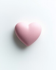 Fototapeta premium Soft pink heart-shaped object on a light background