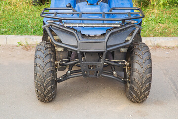 Obraz premium Quad bike. ATV is parked near the house.