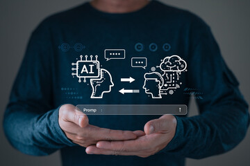 man holding smart AI chatbot and command prompt.Big data storage.Digital Artificial Intelligence technology disruption concept.We are implementing automated tech support and service in the business.