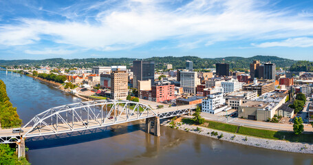 Fototapeta premium Aerial view of Charleston, West Virginia skyline and South Side Bridge. Charleston is the capital and most populous city of the U.S. state of West Virginia and the seat of Kanawha County