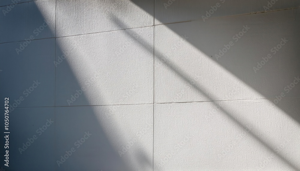 Poster minimalist textured white wall with diagonal sunlight and shadows. perfect for backgrounds, web bann